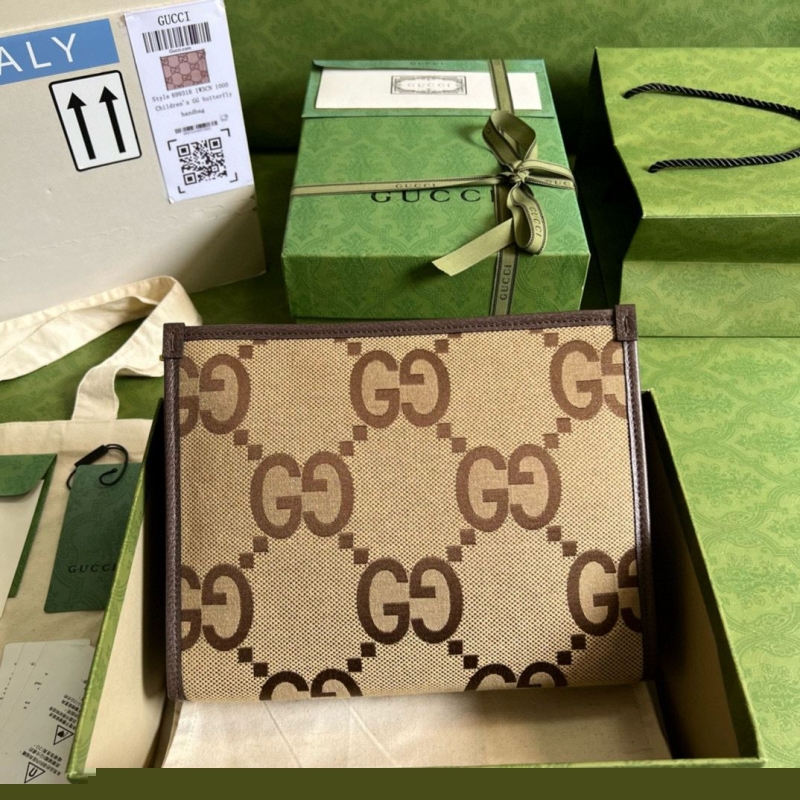 G*u*i clutch bags
